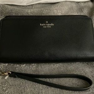 Kate Spade 8”x4.5” clutch/wallet/wristlet. Black pebble leather. Brand new.